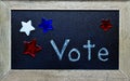 Vote script, surrounded by red, white and blue stars Royalty Free Stock Photo