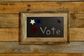 Vote script, surrounded by red, white and blue stars Royalty Free Stock Photo