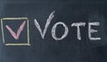 Vote Written On Blackboard. The concept of making choices. Presidential and parliamentary elections. Calling for voting, democracy Royalty Free Stock Photo