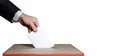 Voter Holds Envelope In Hand Above Vote Ballot On Isolated. Freedom Democracy Concept Royalty Free Stock Photo