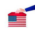 Voter hand putting voting paper into ballot box. USA Election Concept. Presidential Election Day. Royalty Free Stock Photo