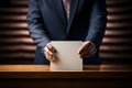 Voter putting voting paper in ballot box during elections. Election voting concept. Royalty Free Stock Photo