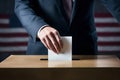 Voter putting voting paper in ballot box during elections. Election voting concept.