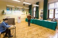 Voters at the polling station during polish parliamentary elections to both the Sejm and Senate.
