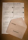 Voting envelopes for Senate and Congress in Spanish general election day, laid on wooden surface