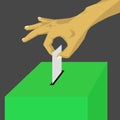 Voting at the green ballot box