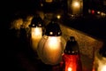 Votive candles burning on a cemetery. Royalty Free Stock Photo