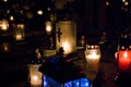 Votive candles burning on a cemetery. Royalty Free Stock Photo