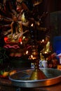 Votive candles and incense, with Buddha Royalty Free Stock Photo