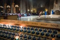 Votive candles inside the Notre Dame cathedral in Paris.