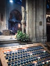 Votive candles inside the Notre Dame cathedral in Paris.