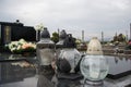 Votive candles lantern on the grave in Slovak cemetery. All Saints' Day. Solemnity of All Saints. All Hallows eve Royalty Free Stock Photo