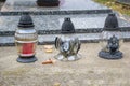 Votive candles lantern on the grave in Slovak cemetery. All Saints' Day. Solemnity of All Saints. All Hallows eve Royalty Free Stock Photo