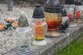 Votive candles lantern on the grave in Slovak cemetery. All Saints' Day. Solemnity of All Saints. All Hallows eve Royalty Free Stock Photo