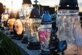 Votive candles lantern on the grave in Slovak cemetery. All Saints' Day. Solemnity of All Saints. All Hallows eve Royalty Free Stock Photo