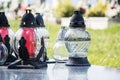 Votive candles lantern on the grave in Slovak cemetery. All Saints' Day. Solemnity of All Saints. All Hallows eve Royalty Free Stock Photo