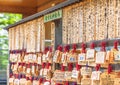 Votive plaques with movie titles written by producers for their success in Akagi shrine.