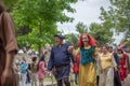 View of actors dressed in medieval clothes on medieval market, blurred background