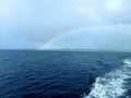 Voyage of Colors: Rainbow Over the Open Sea between Sulawesi mainland and Banggai Island Royalty Free Stock Photo