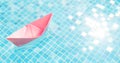 Voyage. Floating pink paper boat water pool abstract ship symbol. Blue water travel abstract boat travel concept paper Royalty Free Stock Photo