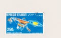 Voyager Spacecraft and Saturn on Postage Stamp