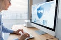 VPN secure connection for telecommuter. Person using Virtual Private Network technology on computer to create encrypted tunnel to Royalty Free Stock Photo