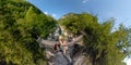 VR360: Active travelers and a puppy cross the hanging bridge over Soca river