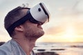 VR, beach and metaverse with a man in a nature using a wireless headset to access the internet. Future, virtual reality Royalty Free Stock Photo