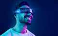 Vr, glasses or man in metaverse on black background gaming, cyber or scifi on futuristic digital overlay. Smile, virtual