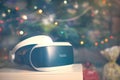 VR headset gift under the Christmas tree with defocused lights Royalty Free Stock Photo