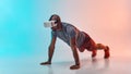VR technology. Full length of young african man in sports clothing doing plank while wearing virtual reality glasses Royalty Free Stock Photo