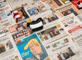 VR Virtual reality mask above major international newspapers Trump