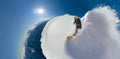 VR360: Woman spray fresh snow as she snowboards in the Canadian backcountry.