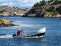 Vrango, Sweden - August 08: Unidentified man drives boat on August 08, 2016 in Vrango, Sweden.