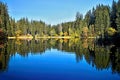 Vrbicke pleso - mirroring on the water level of the Vrbicke tarn in Demanovska valley in Slovakia. Royalty Free Stock Photo