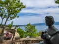 Vrbnik - A statute of a man vith the sea view