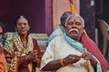 Vrindavan, 22 October 2016: A man holds a flag in time of political demonstration in Vrindavan, UP