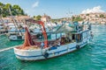 8. 28. 2012. Vrsar. Croatia. Two sailors clean the fish caught. Fishing in the Adriatic sea