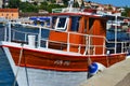 Vrsar, Istria / Croatia - June 27 2011: White and brown small fishing boat in Vrsar Marina. Royalty Free Stock Photo