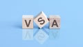 VSA is an abbreviation of the Volume Spread Analysis - the text is written on wooden cubes Royalty Free Stock Photo