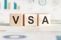 VSA acronym for Volume Spread Analysis in wooden cubes Royalty Free Stock Photo