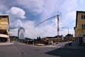 Vsetin, Czech republic - June 02, 2018: High crane between houses in Smetanova street during reconstruction of parking lot