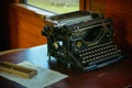 VSETIN, CZECH REPUBLIC/ September 29, 2019: Old vintage typewriter in interior of 1920th wagon of the train