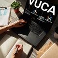 VUCA world concept on screen. Volatility, uncertainty, complexity, ambiguity. Royalty Free Stock Photo