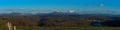 panoramic view of the chain of Puys in Auvergne. Puy-de-Dome and Puy-de-Come snow covered in spring Royalty Free Stock Photo