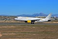 Vueling Airlines Landing At Alicante Airport Royalty Free Stock Photo