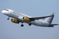 Vueling aiplane flying up in the sky