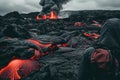 A vulcanologist scientist with his back turned observes the lava flow from a distant volcanic eruption as it slowly solidifies