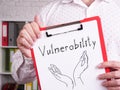 Vulnerability is shown on the photo using the text