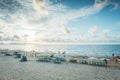 People having rest on beach in Vungtau in sunset light. The Vungtau city is popular among Ho chi minh city people as sea resort